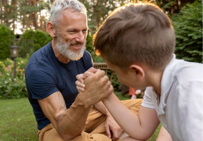 Grandparent bonding with grandchild while discussing enduring guardianship responsibilities