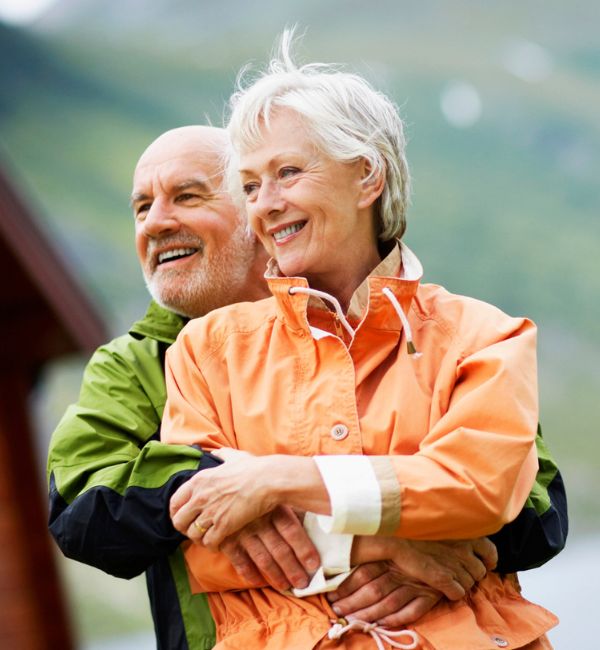 Happy senior couple after successfully contesting a will with legal support.