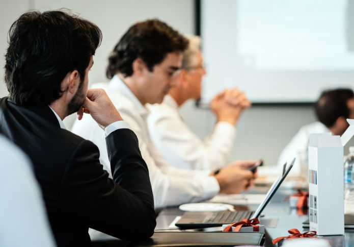 Employment discrimination lawyers meeting with clients to discuss workplace legal rights.
